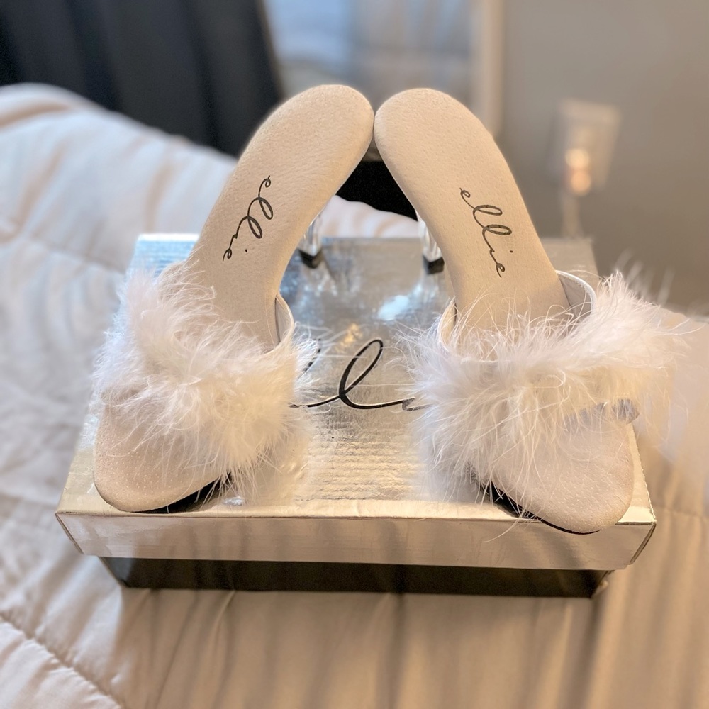 3” Heel in the color White. Never Worn, size 8.